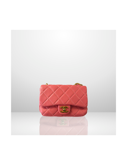 The Rosé Élégance Mini Coach Handbag